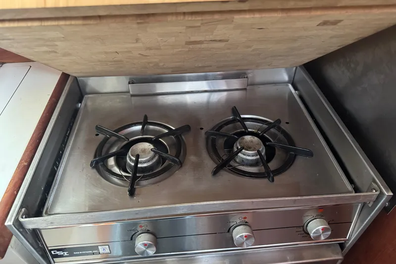 Slide: The Image of Two-burner stainless steel stove in a 1988 Catalina 34 yacht kitchen. - 15