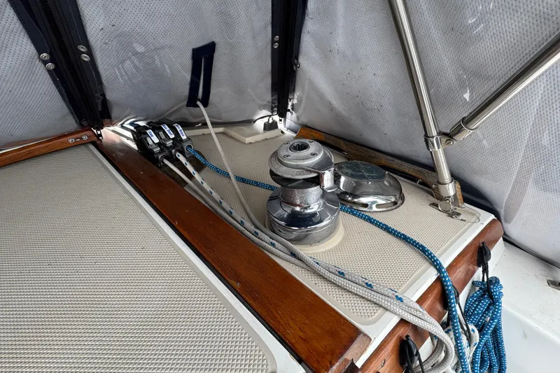 Slide: The Image of Sailing equipment on 1988 Catalina 34 yacht, featuring winches and ropes. - 47