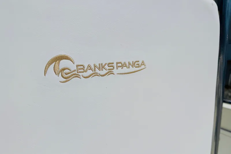 Slide: The Image of 2023 Banks Panga 23 Center Console logo on white surface. - 10