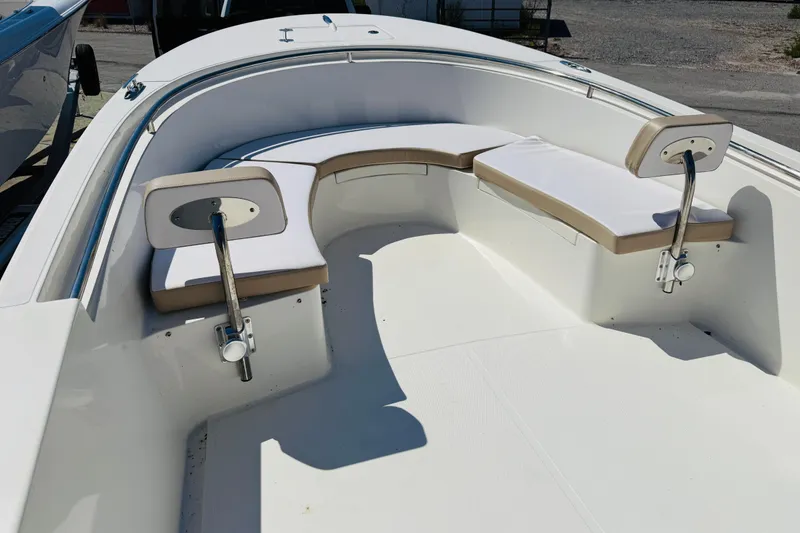Slide: The Image of 2023 Banks Panga 23 Center Console boat interior with cushioned seating and adjustable backrests. - 12
