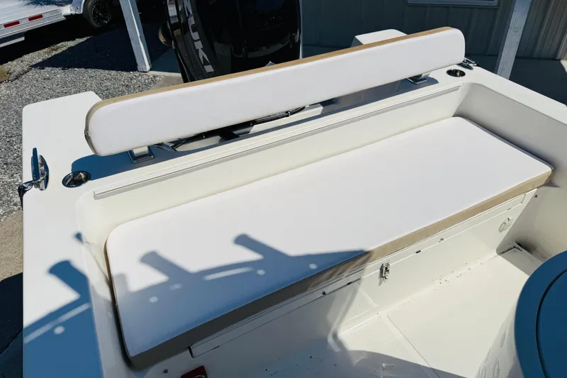 Slide: The Image of 2023 Banks Panga 23 Center Console boat with white cushioned seating. - 14