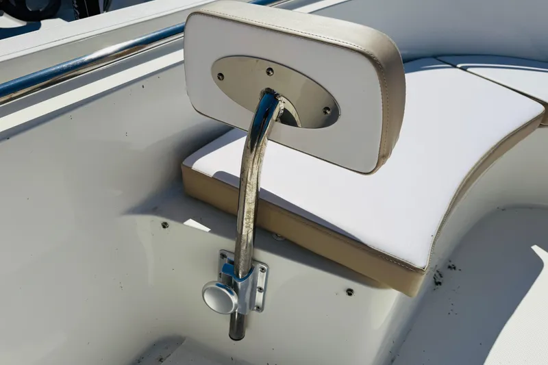 Slide: The Image of 2023 Banks Panga 23 Center Console boat seat detail with white and beige upholstery. - 6