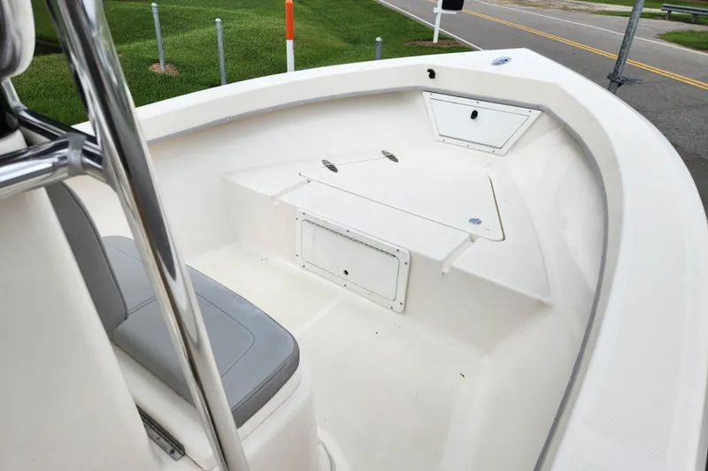 Slide: The Image of 2023 May-Craft 1900CC boat interior with seating and storage compartments. - 7