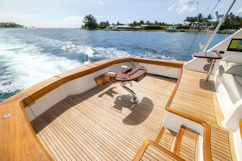 Slide: The Image of Luxurious 2020 Viking 80 Convertible yacht deck with scenic ocean view. - 42