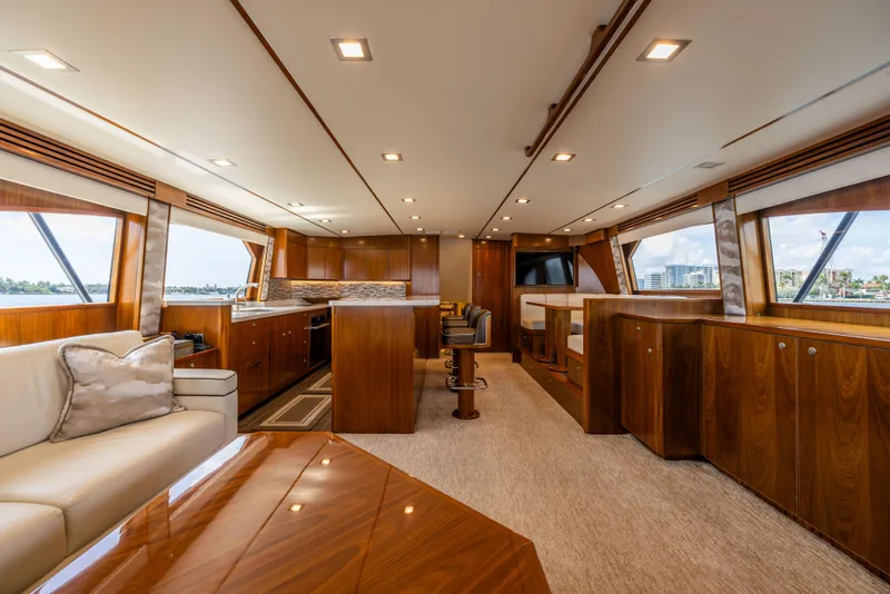 Slide: The Image of Luxurious interior of 2020 Viking 80 Convertible yacht with elegant wood finishes and modern design. - 6