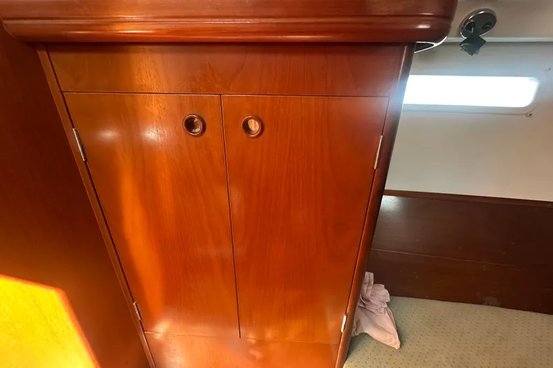 Slide: The Image of Wooden cabinet interior of 2003 Beneteau Oceanis Clipper 331 sailboat. - 69
