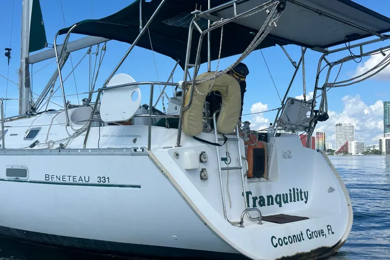Slide: The Image of 2003 Beneteau Oceanis Clipper 331 sailboat docked in Coconut Grove, Florida. - 9