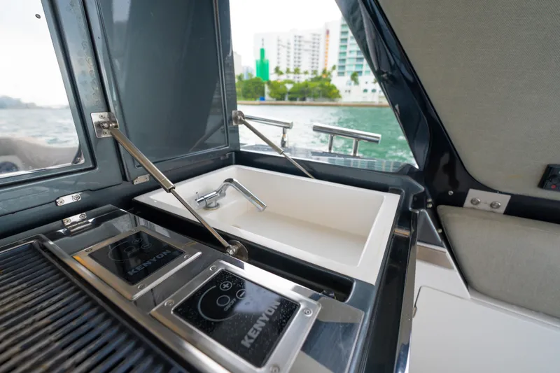 Slide: The Image of Luxury Azimut Verve 47 yacht kitchen area with sink and stove, 2021 model. - 15