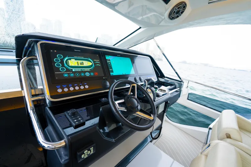 Slide: The Image of Helm of 2021 Azimut Verve 47 yacht with advanced navigation displays. - 19