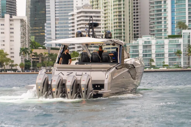 Slide: The Image of 2021 Azimut Verve 47 yacht cruising in urban waterfront setting. - 2