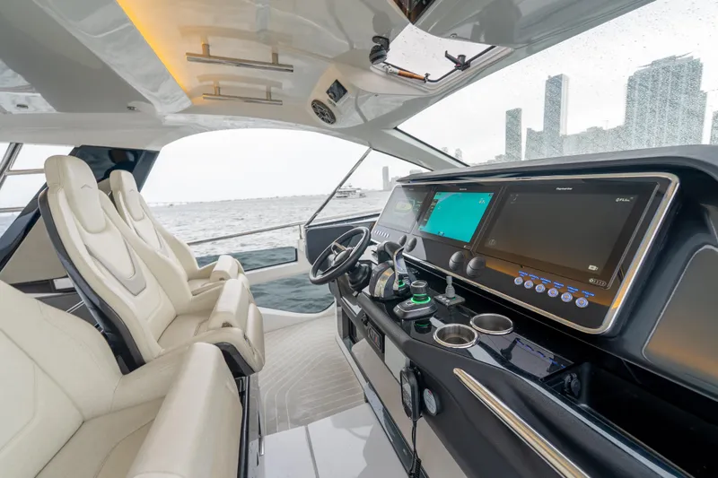 Slide: The Image of Interior of 2021 Azimut Verve 47 yacht with modern dashboard and luxurious seating. - 20