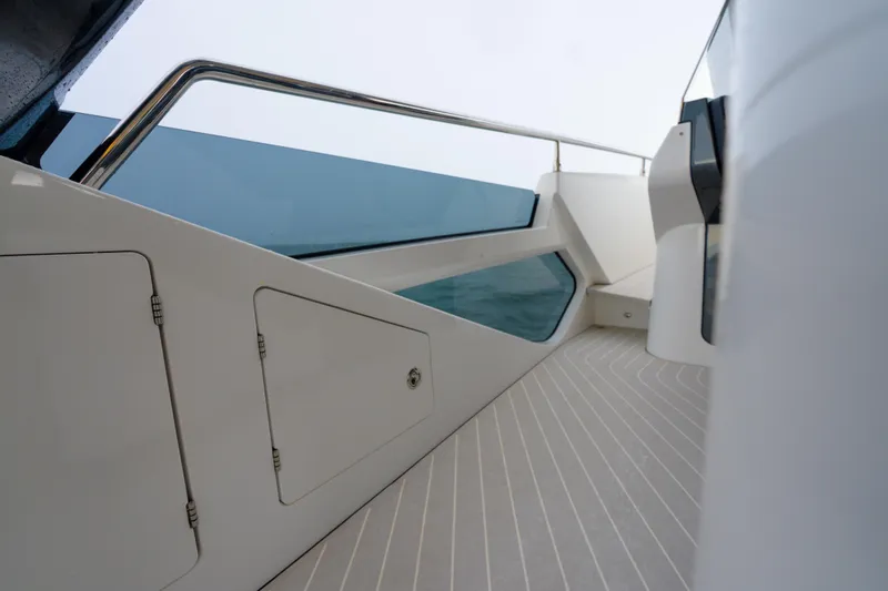 Slide: The Image of Azimut Verve 47 yacht deck, 2021 model, featuring sleek design and modern railings. - 21