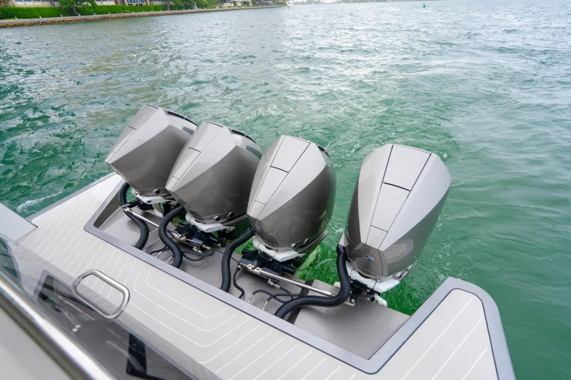 Slide: The Image of Four powerful outboard engines on a 2021 Azimut Verve 47 yacht in water. - 27