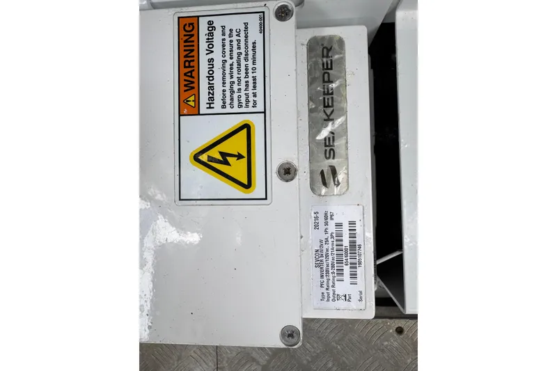 Slide: The Image of Warning label on Seakeeper device in 2021 Azimut Verve 47 boat. - 44