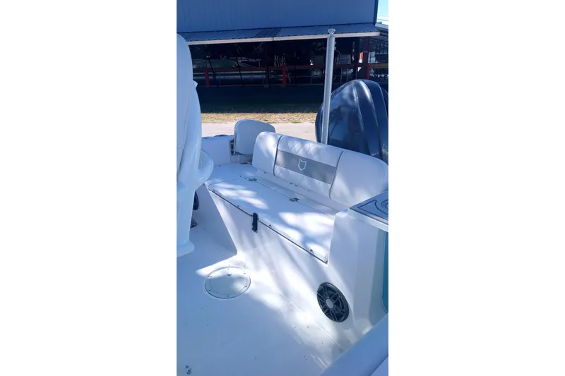 Slide: The Image of 2025 Seafox 228 Commander boat interior with seating and storage. - 7