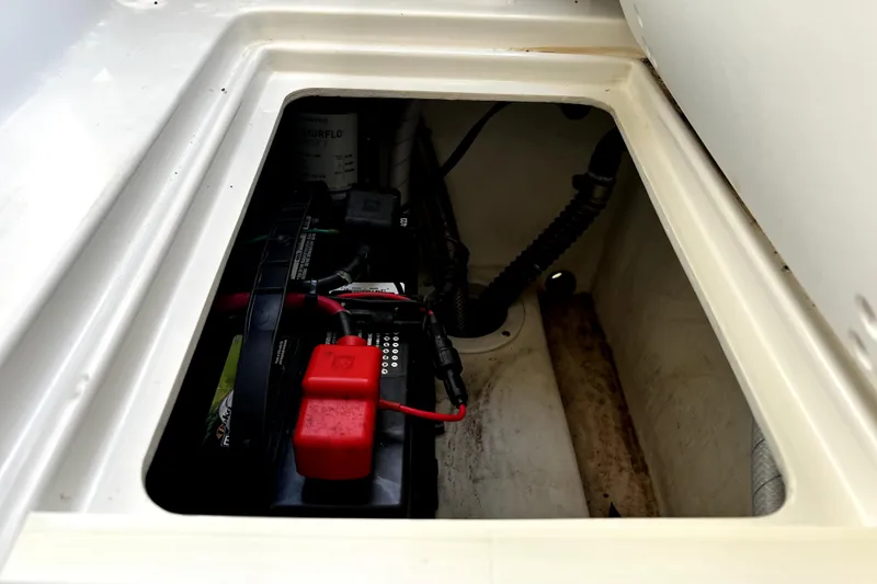 Slide: The Image of Battery compartment of 2023 Parker 2120 Sport Cabin boat, showing wiring and connections. - 42