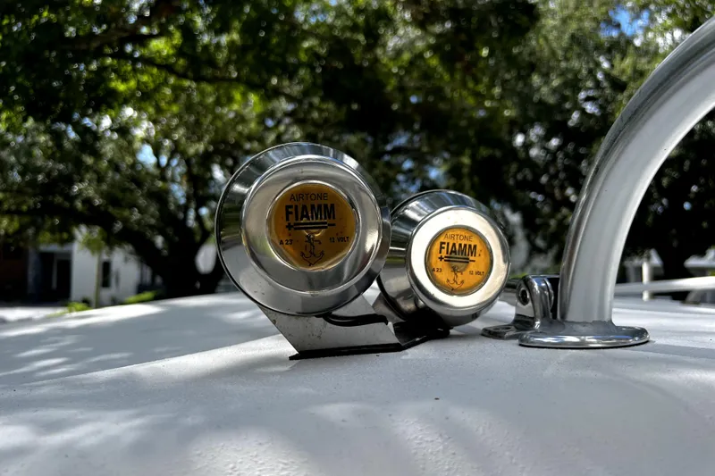 Slide: The Image of Close-up of FIAMM airtone horns on a 2023 Parker 2120 Sport Cabin boat. - 62