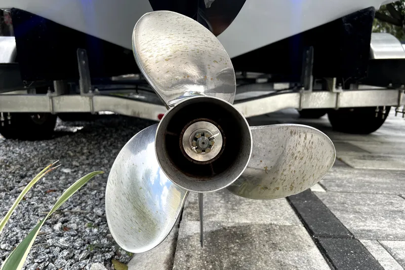 Slide: The Image of Close-up of a 2023 Parker 2120 Sport Cabin boat propeller on a trailer. - 8
