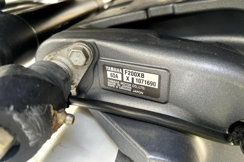 Slide: The Image of Close-up of Yamaha F200XB engine label on Parker 2120 Sport Cabin, 2023 model. - 96