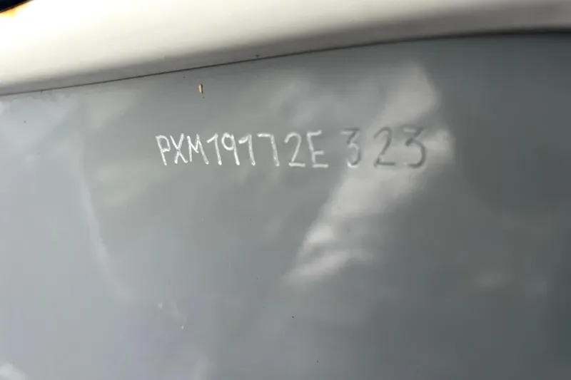 Slide: The Image of Hull identification number on 2023 Parker 2120 Sport Cabin boat. - 97