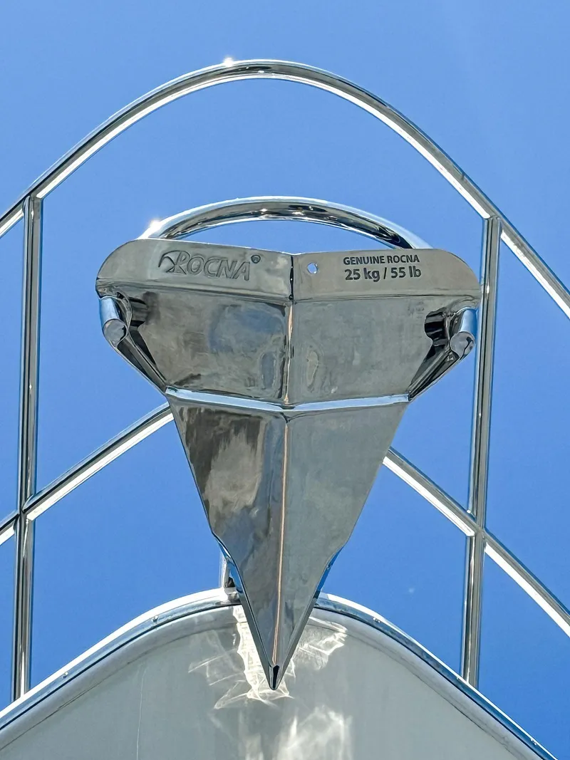 Slide: The Image of Stainless steel anchor on 2018 Princess S60 yacht against clear blue sky. - 17