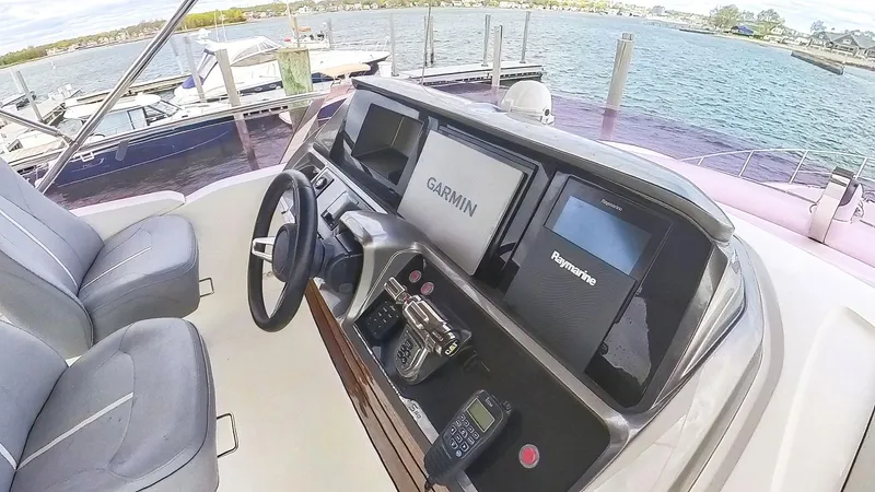 Slide: The Image of Helm of 2018 Princess S60 yacht with Garmin and Raymarine navigation systems. - 23