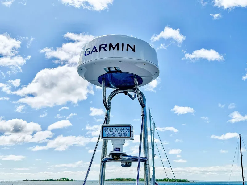 Slide: The Image of Garmin radar on 2018 Princess S60 yacht against a clear blue sky. - 30