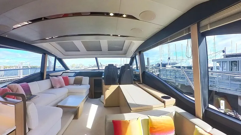 Slide: The Image of Luxurious interior of a 2018 Princess S60 yacht with modern seating and large windows. - 35