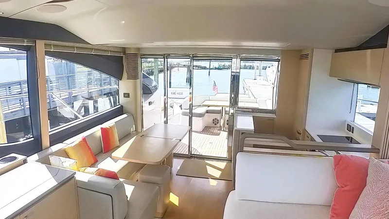 Slide: The Image of Interior of 2018 Princess S60 yacht with modern seating and vibrant cushions. - 36