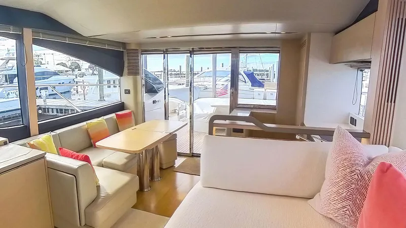 Slide: The Image of Luxurious 2018 Princess S60 yacht interior with modern seating and marina view. - 40