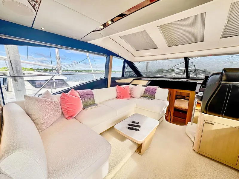 Slide: The Image of Luxurious interior of a 2018 Princess S60 yacht with plush seating and modern design. - 41
