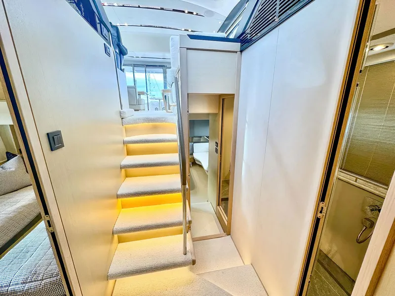Slide: The Image of Luxurious interior of 2018 Princess S60 yacht with modern staircase and elegant design. - 48