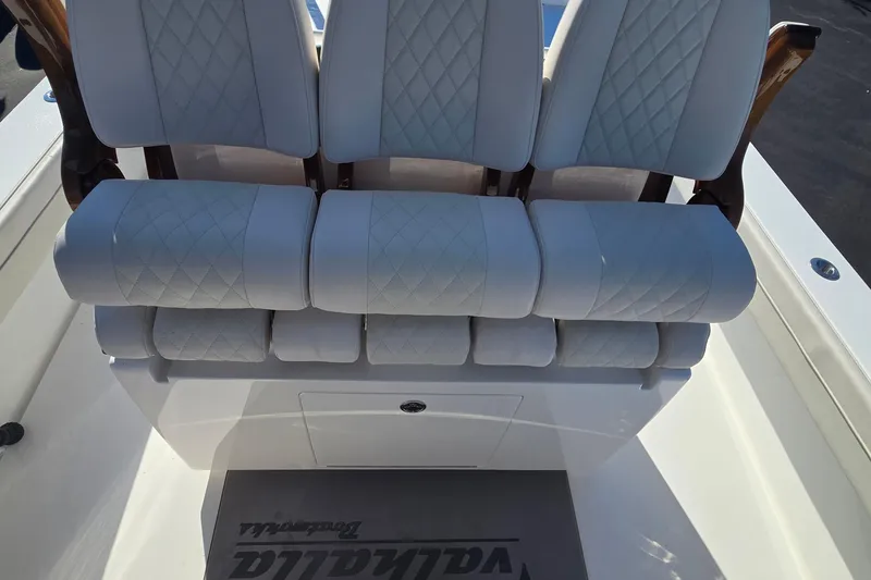 Slide: The Image of 2025 Valhalla Boatworks V-29 Hybrid seating with quilted upholstery and sleek design. - 8