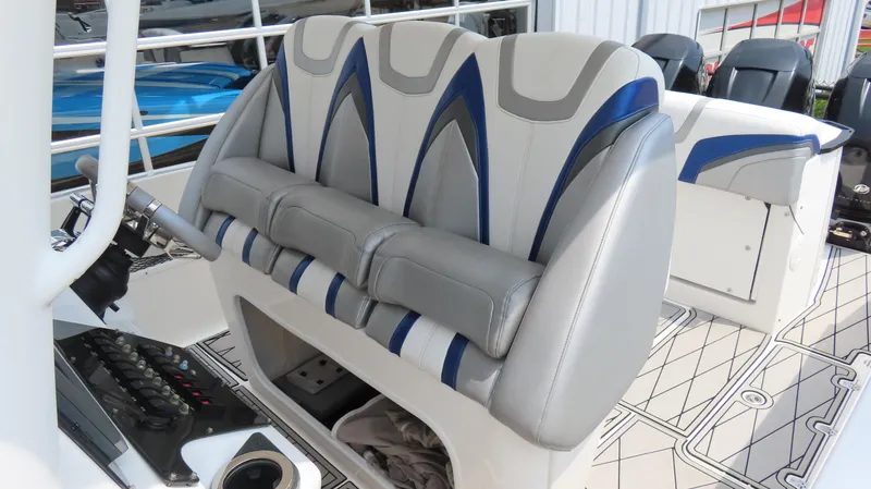 Slide: The Image of 2015 Sunsation 34 CCX boat interior with stylish seating and control panel. - 15