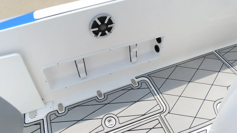 Slide: The Image of 2015 Sunsation 34 CCX boat interior with speaker and patterned flooring. - 18