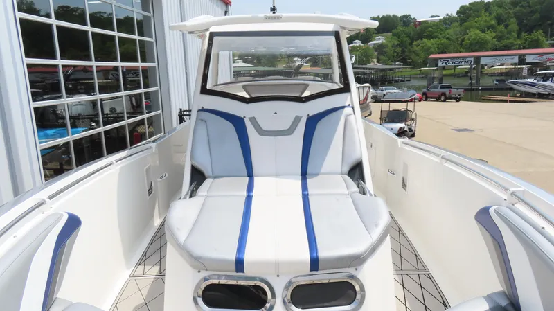 Slide: The Image of 2015 Sunsation 34 CCX boat with sleek seating and modern design. - 22