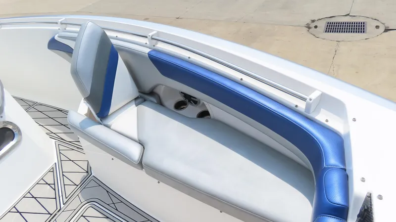 Slide: The Image of 2015 Sunsation 34 CCX boat interior with blue and white seating. - 23