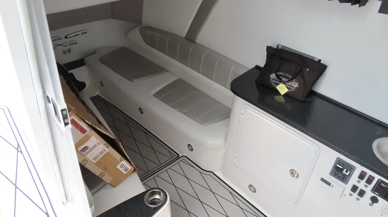 Slide: The Image of 2015 Sunsation 34 CCX cabin interior with seating and storage. - 29