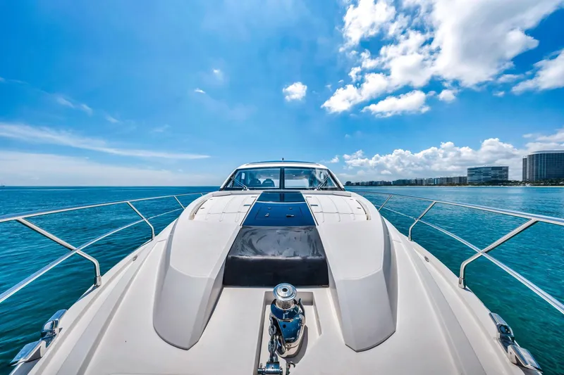 Slide: The Image of 2018 Fairline Targa 53 OPEN yacht cruising on clear blue waters under a sunny sky. - 10