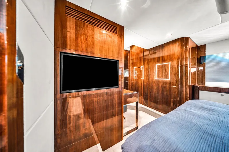 Slide: The Image of Luxurious interior of 2018 Fairline Targa 53 OPEN yacht with wood paneling and modern amenities. - 38