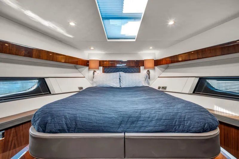 Slide: The Image of Luxurious cabin interior of 2018 Fairline Targa 53 OPEN yacht with skylight and elegant bedding. - 42