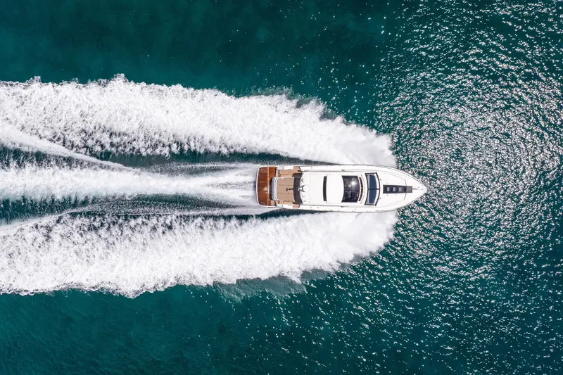 Slide: The Image of Aerial view of 2018 Fairline Targa 53 OPEN yacht cruising on blue ocean waters. - 49