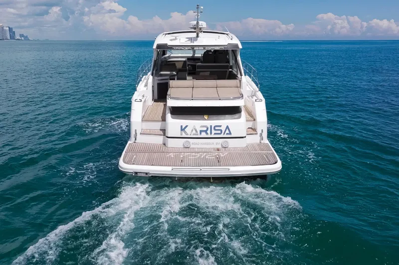 Slide: The Image of 2018 Fairline Targa 53 OPEN yacht cruising on open sea, rear view. - 5