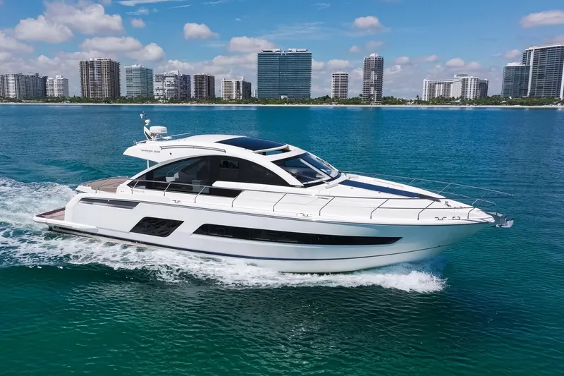 Slide: The Image of 2018 Fairline Targa 53 OPEN yacht cruising near city skyline on a sunny day. - 57