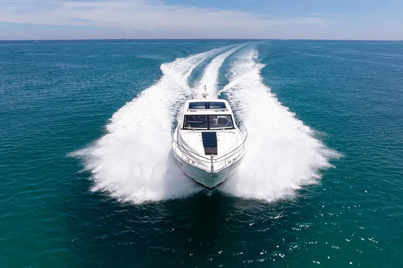 Slide: The Image of 2018 Fairline Targa 53 OPEN yacht cruising on clear blue ocean waters. - 58