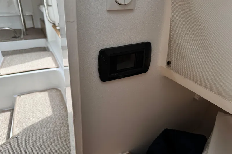 Slide: The Image of Interior view of 2025 Nimbus Commuter 9, featuring a wall-mounted control panel. - 23