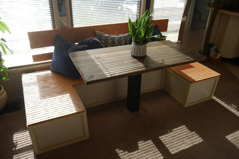 Slide: The Image of Modern kitchen interior in a 1996 STARDUST Cruiser, featuring white cabinetry and stainless steel appliances. - 15