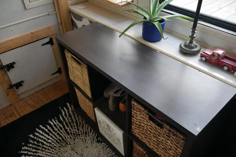 Slide: The Image of Bathroom in 1996 STARDUST Cruiser with heron artwork and teal accents. - 25