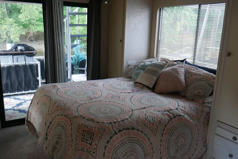 Slide: The Image of Bathroom vanity in 1996 Stardust Cruisers, featuring mirror cabinets and modern fixtures. - 26