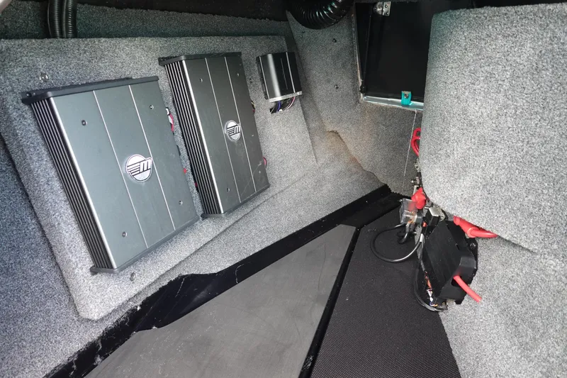 Slide: The Image of Audio system components in a 2021 Malibu Wakesetter 22 LSV boat interior. - 25